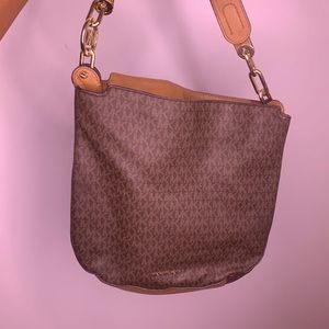 This is a really CUTE brown Michael Kors purse